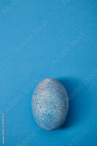 Easter egg on a blue background