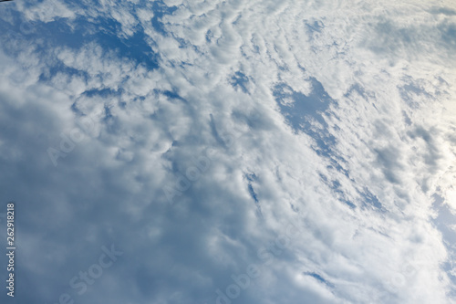 dramatic white cloud on blue sky, nature background © sutichak
