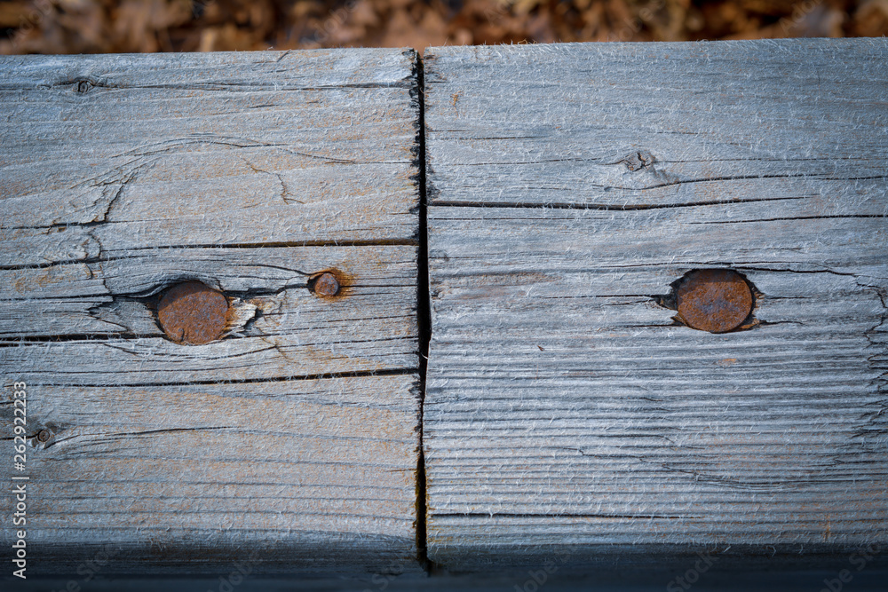 Old wooden surface with metallic nails Old wooden surface with metallic nails