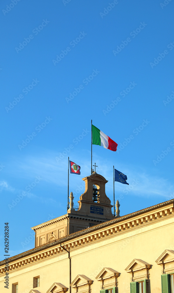 Three flags one of Italian Republic one of Italy and one of Euro