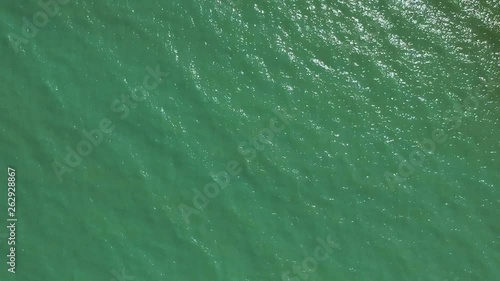 Afternoon high drone view from the Lake Balaton's waves and its water roof near the shore of Zamárdi, Lake Balaton. ( DJi Drone footage I 29.97 fps ) photo