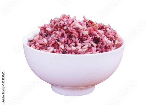 A white bowl of cooked red rice isolated on white background with clipping path. cooked red rice. organic food. .