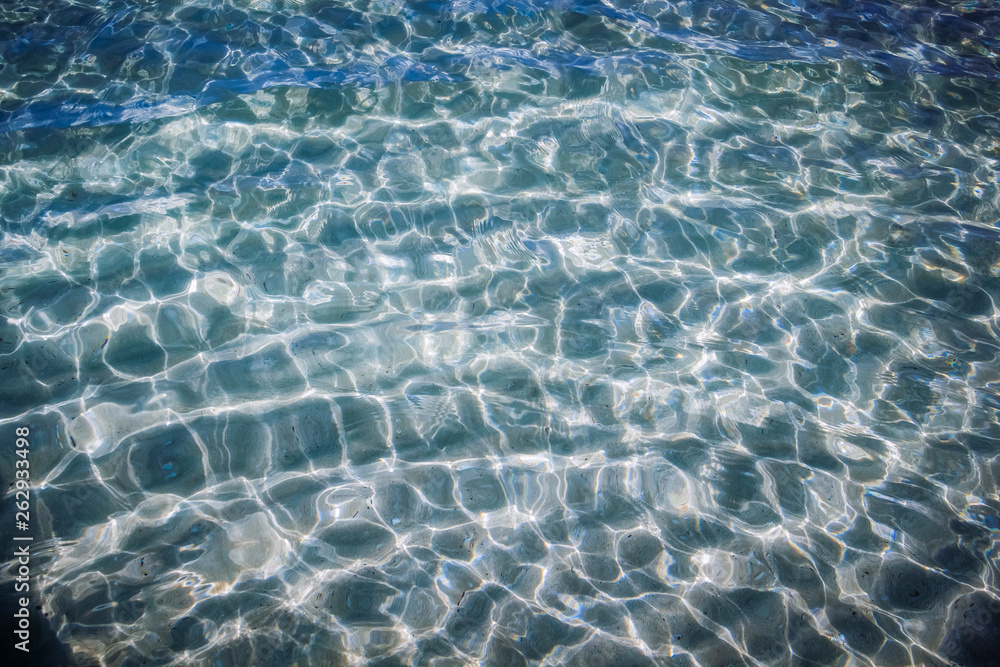 Fototapeta premium The surface of azure water as a background.