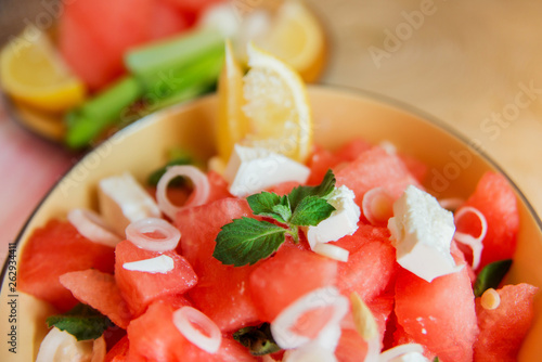 Summer light salad of watermelon, lime, mint and cheese