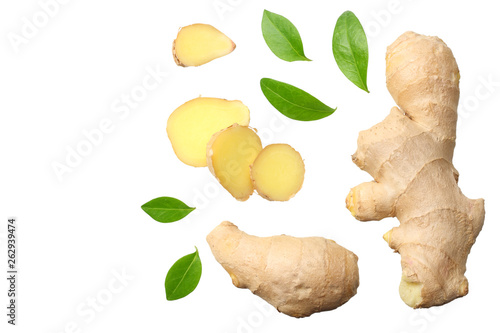 sliced ginger with leaves isolated on white background top view