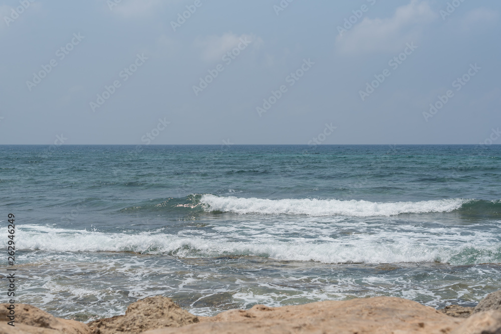 Waves on the beach. Clean background. Green storm sea.