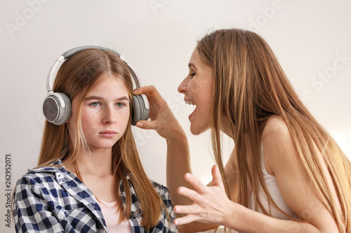 Sad teenage girl having arg...
