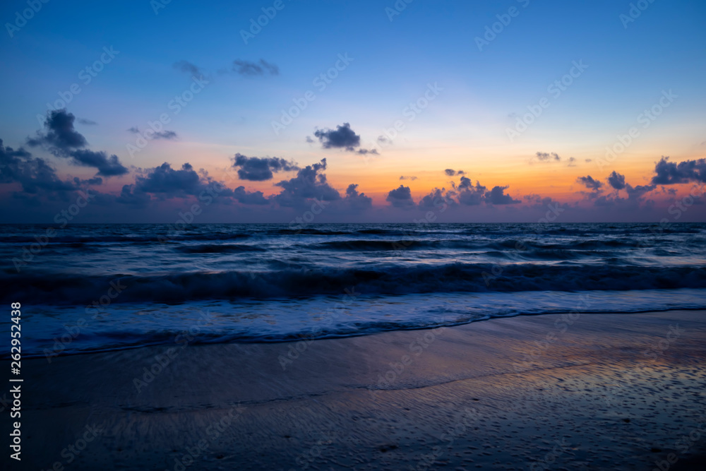 Landscape of the sea on the beach before sunrise.