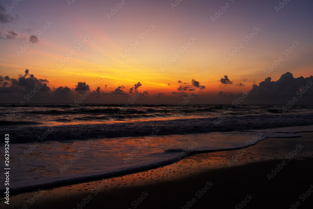 Landscape of the sea on the beach before sunrise.