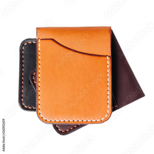 Leather accessories on a white background, wallets, coin boxes and straps, isolated © Александр Костромити