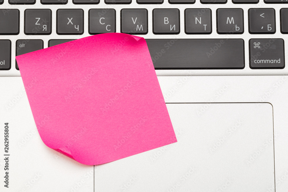 Sticky note on laptop with copy space. For all concept Sticky note on laptop with copy space. For all concept