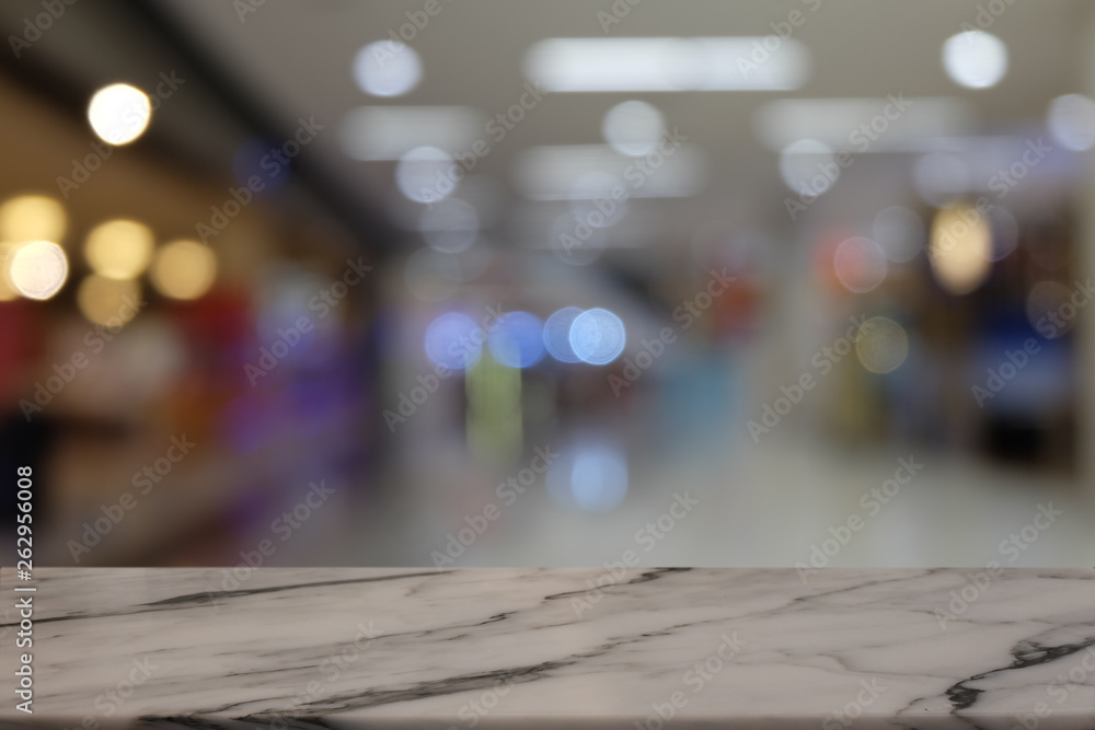 Empty rock table in front of abstract blurred bokeh background of restaurant . can be used for display or montage your products.Mock up for space.