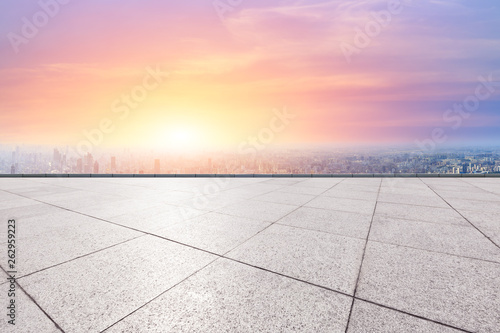 Shanghai city skyline and empty square floor with beautiful clouds scenery at sunset