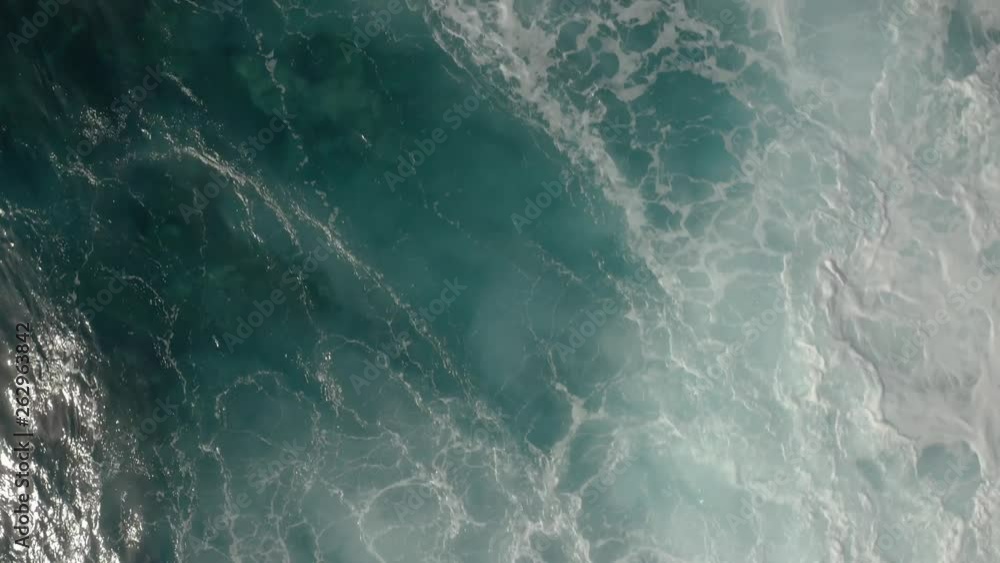 Sunny Day, Canary Islands.Top View of the Giant Waves, Foaming and Splashing in the Atlantic. Aerial view of crushing ocean waves. Drone shot of waves 4K. Sunny Day, Canary Islands.Top View of the Giant Waves, Foaming and Splashing in the Atlantic. Aerial view of crushing ocean waves. Drone shot of waves 4K.