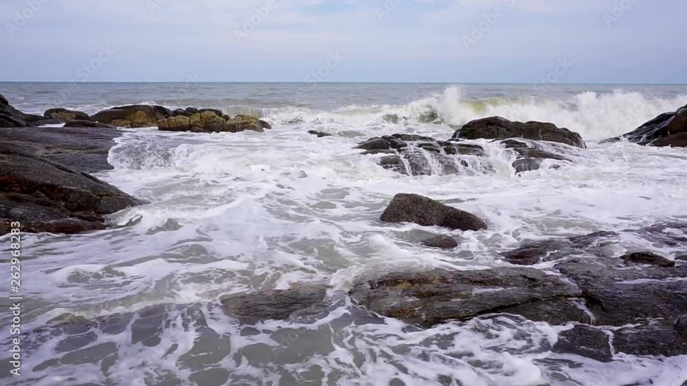 Slow motion natural seascape wave hit the rock Slow motion natural seascape wave hit the rock