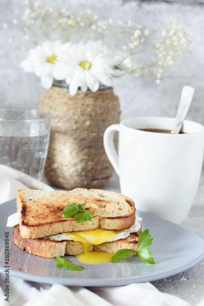 Toast with egg and coffee for breakfast