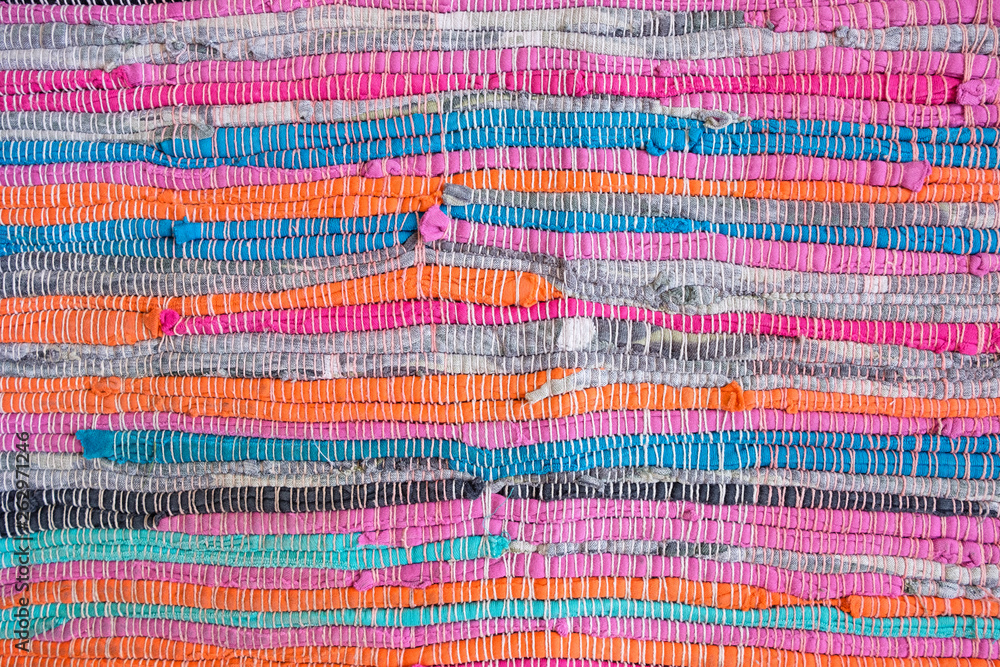 Background from a multi-colored woolen plaid Background from a multi-colored woolen plaid