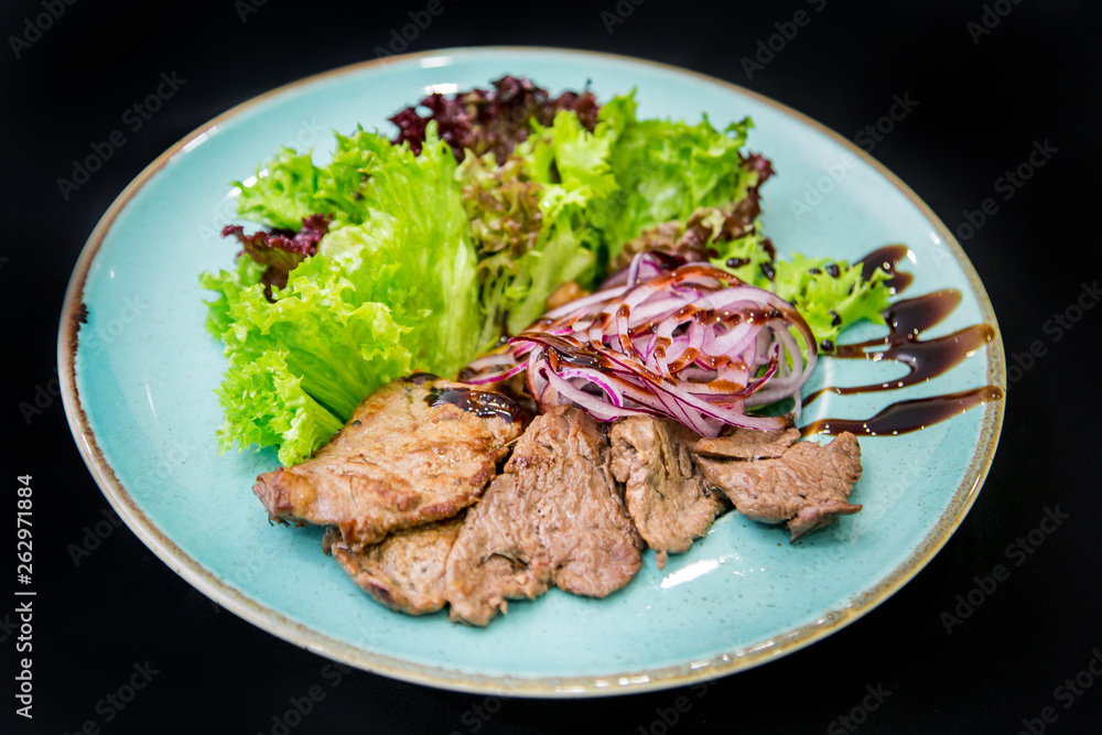 pork with rice and vegetables on white plate pork with rice and vegetables on white plate