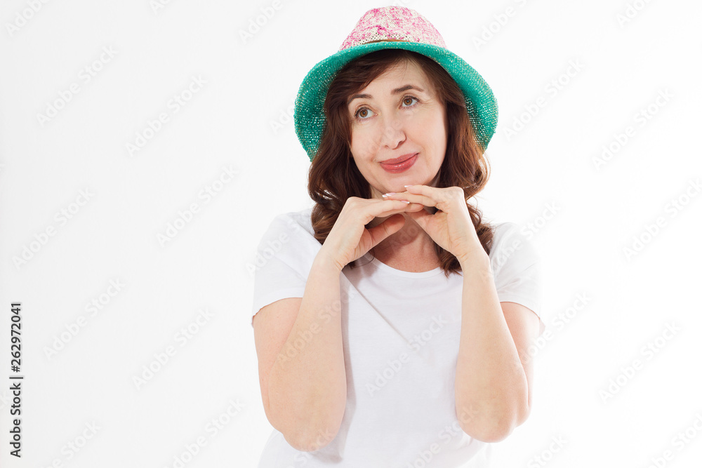 Happy woman in summer hat isolated on white background. Sun protection skin care and vacation holidays concept. Middle age female with white healthy teeth and menopause. Travel vacation. Copy space Happy woman in summer hat isolated on white background. Sun protection skin care and vacation holidays concept. Middle age female with white healthy teeth and menopause. Travel vacation. Copy space