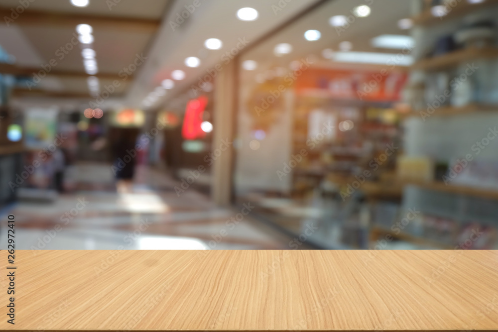 Empty dark wooden table in front of abstract blurred bokeh background of restaurant . can be used for display or montage your products.Mock up for space. Empty dark wooden table in front of abstract blurred bokeh background of restaurant . can be used for display or montage your products.Mock up for space.