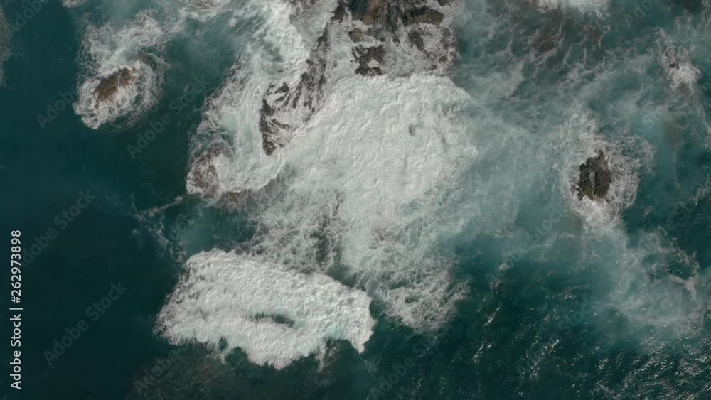 Aerial view of crushing ocean waves. Drone shot of waves 4K. Top View of the Giant Waves, Foaming and Splashing in the Atlantic, Sunny Day, Canary Islands Aerial view of crushing ocean waves. Drone shot of waves 4K. Top View of the Giant Waves, Foaming and Splashing in the Atlantic, Sunny Day, Canary Islands