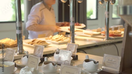 Breakfast buffet table in luxury resort hotel restaurant with assorted food, pastries, sweet cerea and drinks. Food for traditional morning breakfast and brunch in tourist hotel.