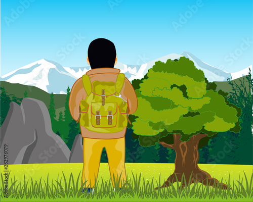 Man traveler admires nature and snow mountain