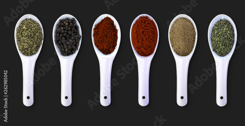 Spices. Spice in Ceramic spoon isolated on a white background