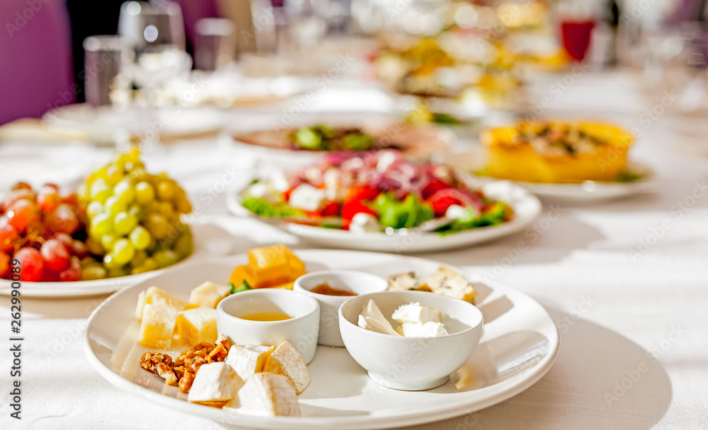 Served tables in restaurants and cafes, meals and drinks on the tables, room design. Served tables in restaurants and cafes, meals and drinks on the tables, room design.