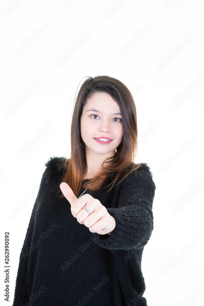 Portrait of an excited young woman thumbs up Portrait of an excited young woman thumbs up