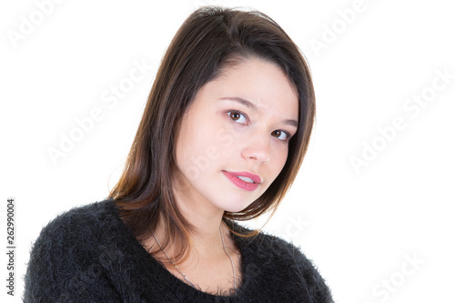 Portrait of young lovely woman with dark hair posing with kind smile isolated over white background