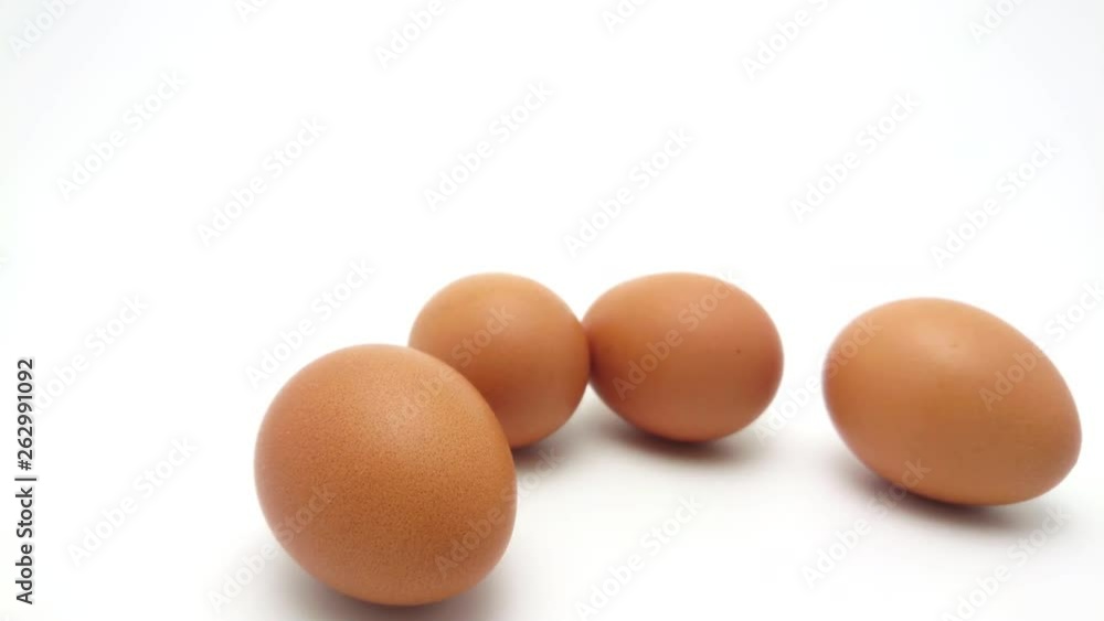 Slide Shot of the raw chicken eggs group isolated on white background Slide Shot of the raw chicken eggs group isolated on white background