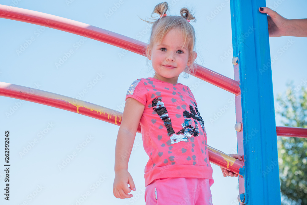 Concept of children life. Little child having fun in a beach. Happy child playing in the nature . Kid having fun outdoors. Summer vacation and healthy lifestyle Concept of children life. Little child having fun in a beach. Happy child playing in the nature . Kid having fun outdoors. Summer vacation and healthy lifestyle