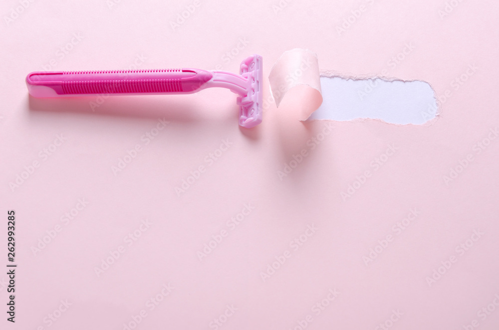 Razor for woman on the pink background.Sharp and safe shaving.Torn ...