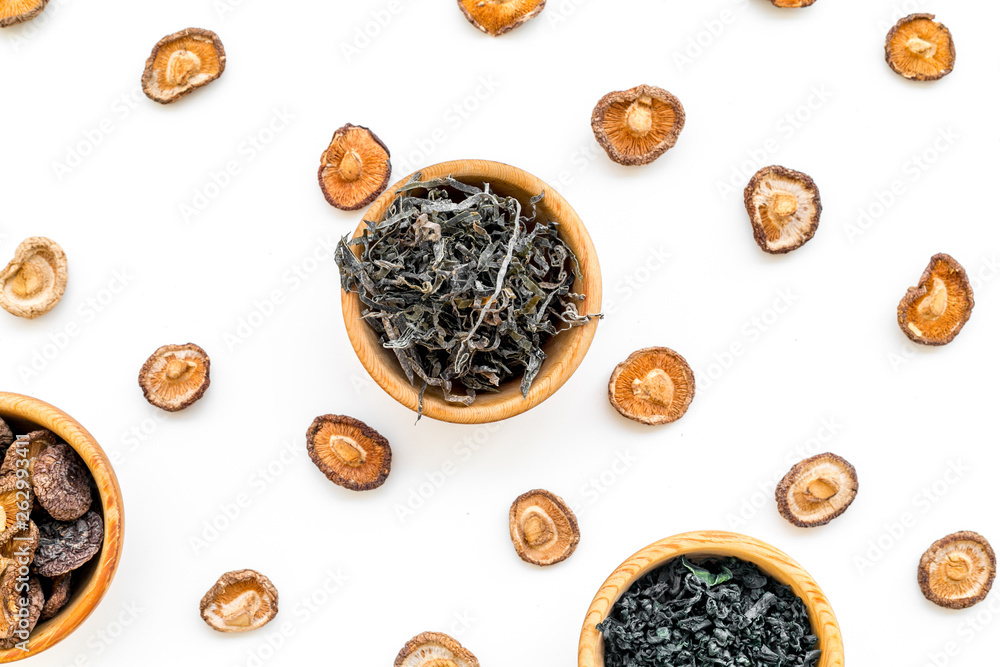 weeds, mushrooms in bowl pattern to cook Chinese and Japanese food on white background top view weeds, mushrooms in bowl pattern to cook Chinese and Japanese food on white background top view