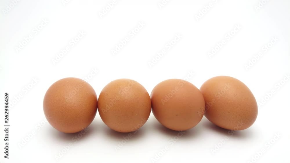 Slide Shot of the raw chicken eggs group isolated on white background Slide Shot of the raw chicken eggs group isolated on white background