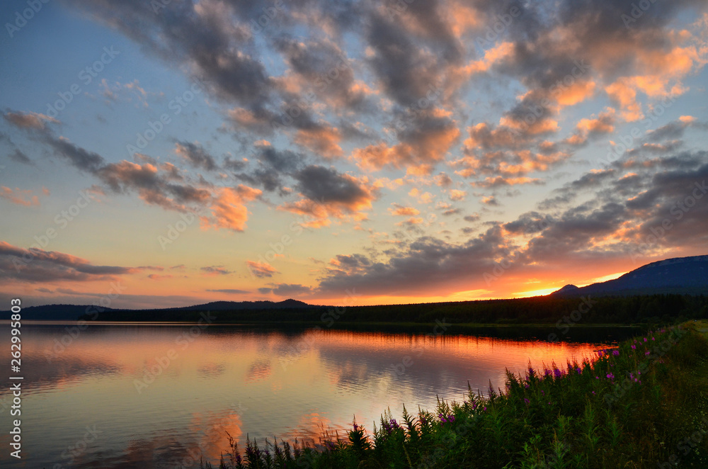 Mountains of the southern Urals in summer. Sunset on lake Zyuratkul.