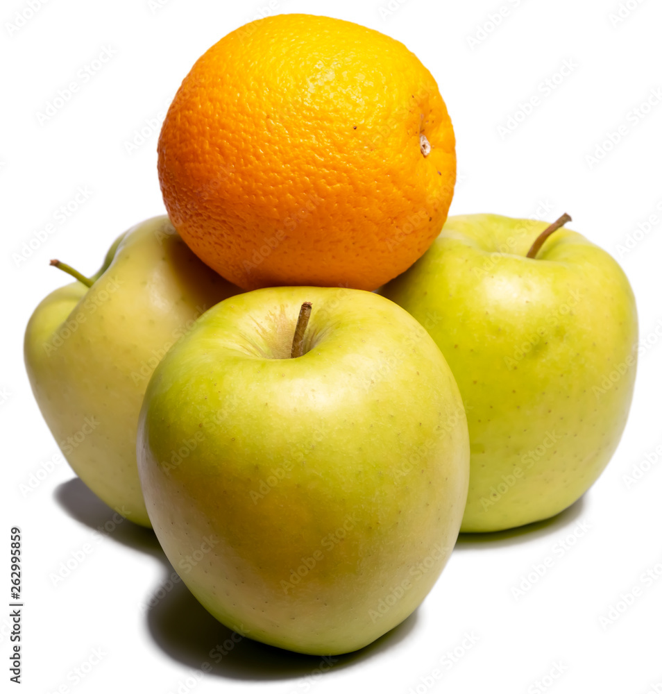 Three green apples and orange on a white background, isolated Apple. Be unique. Three green apples and orange on a white background, isolated Apple. Be unique.