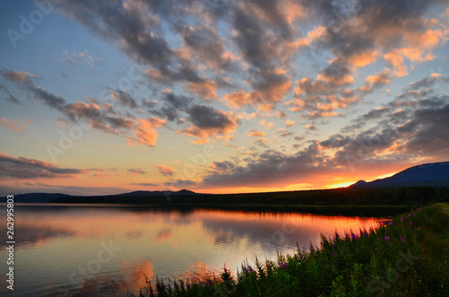 Mountains of the southern Urals in summer. Sunset on lake Zyuratkul.