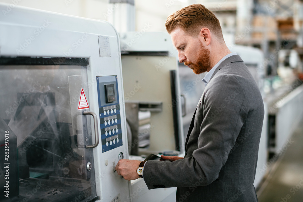 Manager checks machines at the factory. Inspector checks a factory. Supervisor runs his daily check at work. Factory worker setting the tech up for work. Manager checks machines at the factory. Inspector checks a factory. Supervisor runs his daily check at work. Factory worker setting the tech up for work.
