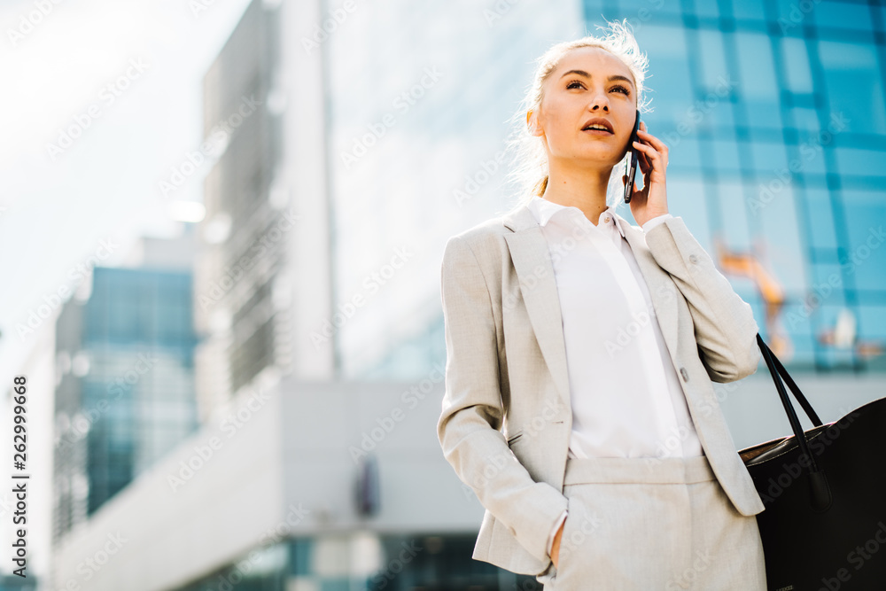 Young businesswoman on the phone. Female manager on the phone. Young businesswoman on the phone. Female manager on the phone.