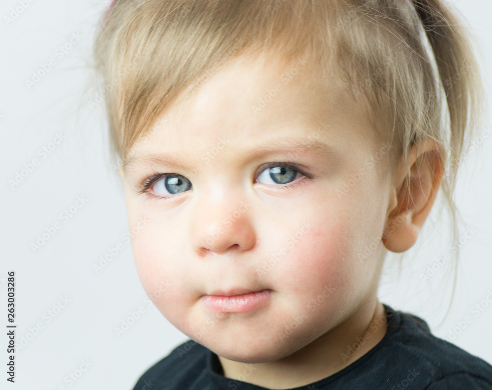 Portrait of a little girl with green eyes Portrait of a little girl with green eyes
