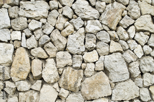 Old rural stone wall closeup