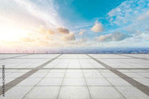 Shanghai city skyline and empty square floor with beautiful clouds at sunset high angle view