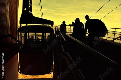 Transportation background with people and cable car at high altitude © elephotos
