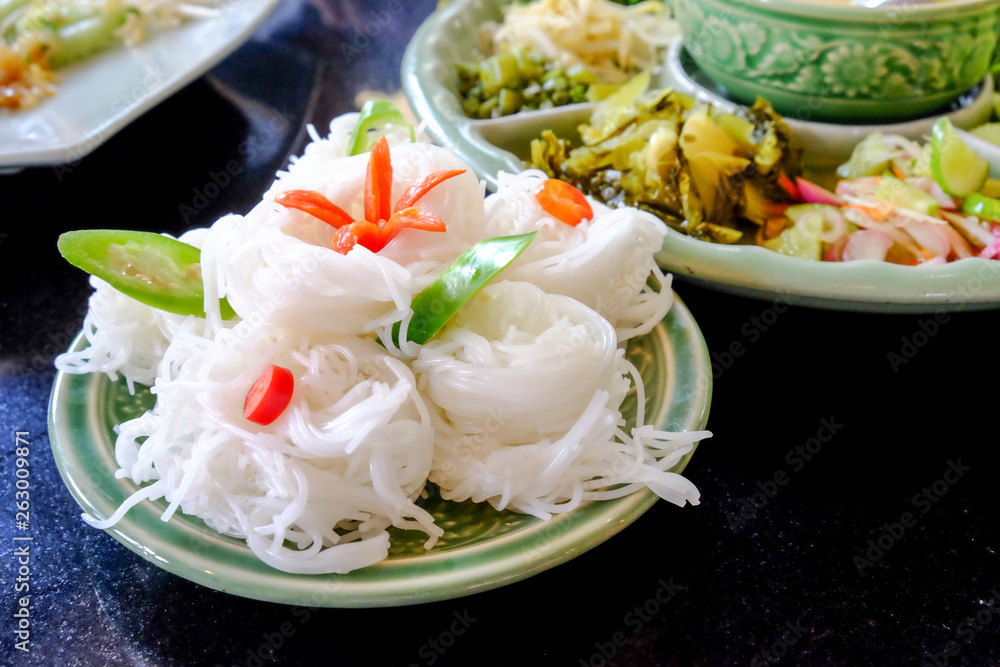 Thai food, rice noodle with chicken green curry Thai food, rice noodle with chicken green curry