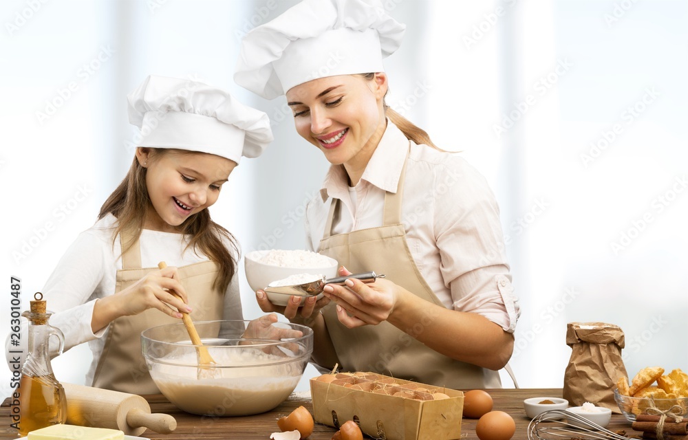 Portrait of adorable little girl preparing healthy food at kitchen Portrait of adorable little girl preparing healthy food at kitchen