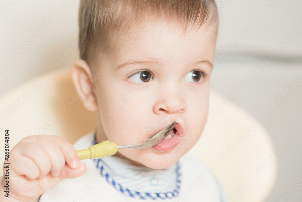 the kid in the kitchen eats milk porridge the kid in the kitchen eats milk porridge