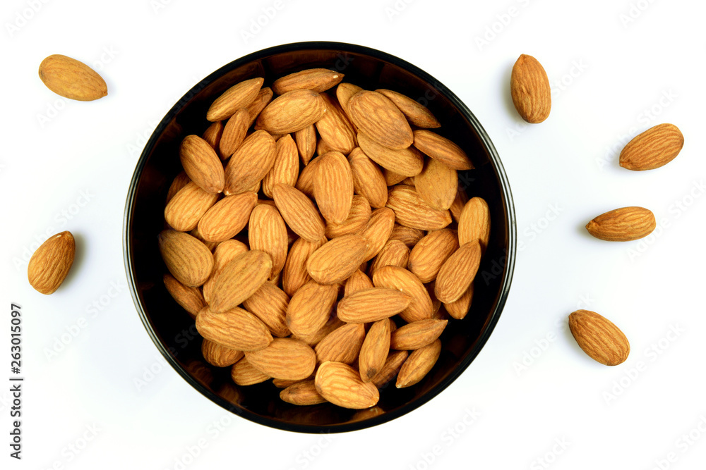 Healthy Almond Seeds in a bowl on white background Healthy Almond Seeds in a bowl on white background