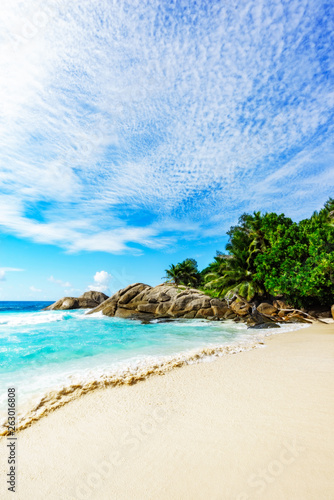 paradise tropical beach palms rocks white sand turquoise water  seychelles 3